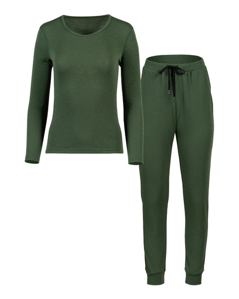 Packshot of women's long sleeve and joggers set in the color dark green