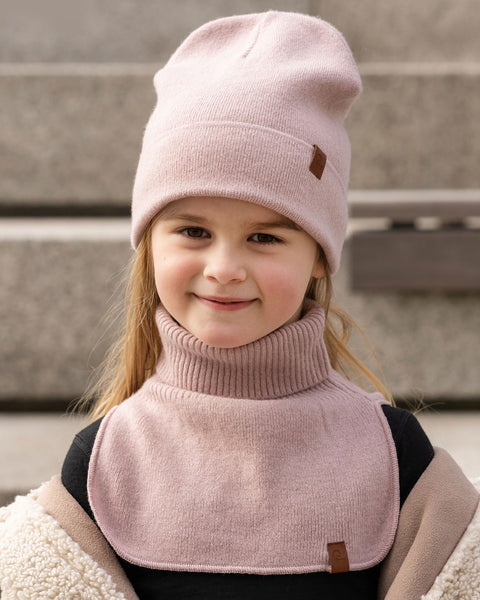 Child wearing dusty pink Merino wool knit dickie and beanie, soft thermal neck warmer for winter