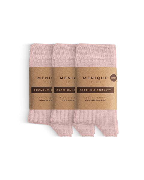 A 3-pack of kids’ pale pink ribbed merino wool socks labeled “Menique Premium Quality.