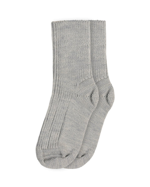 The Menique Kids' Merino Rib Thick Socks in light gray color. 
