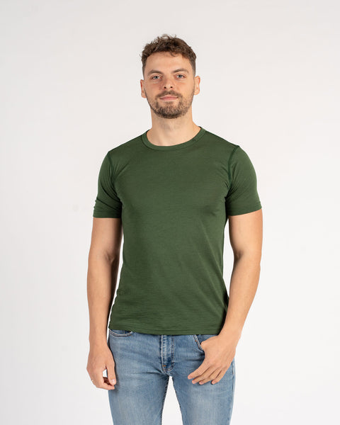 The menique men's 160 Merino wool T-Shirt in Dark Green color.