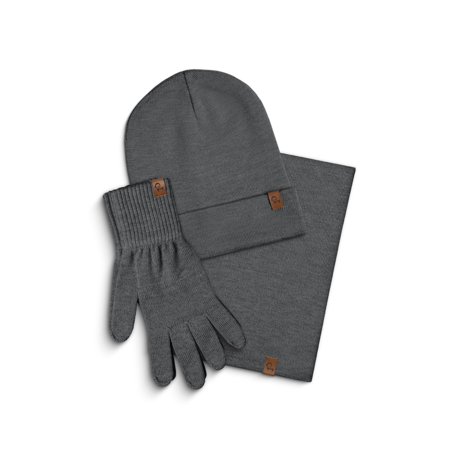 Beige knit beanie, gloves, and scarf set on a white background