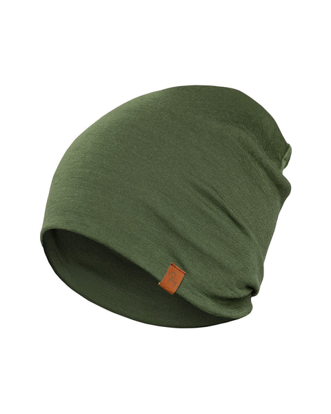 The picture features a unisex dark green beanie made fro merino wool. It has a small logo on the side and is in a white background.